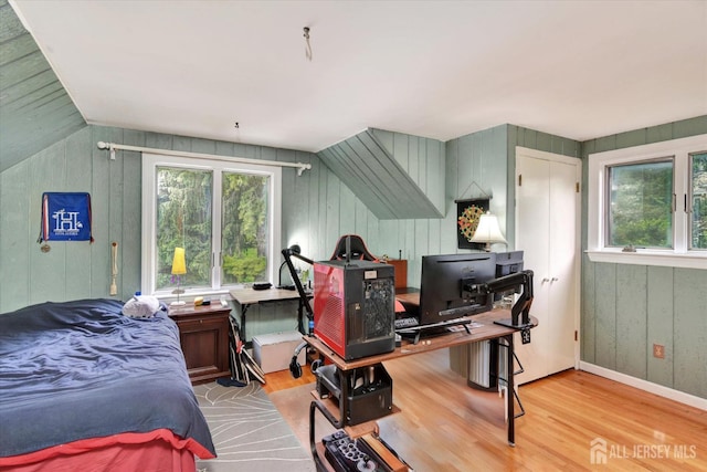 25 Deer Path, Holmdel, NJ 07733 - bedroom with wood finished floors, multiple windows, wood walls, a desk, and lofted ceiling