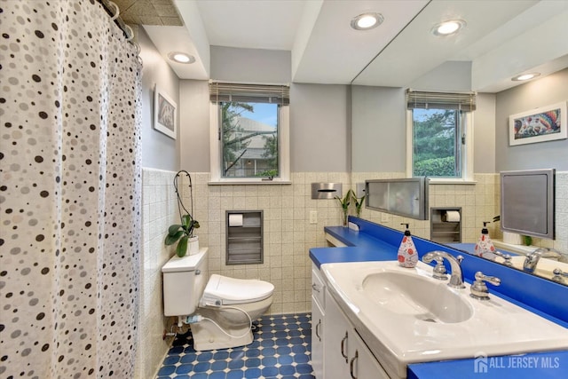 25 Deer Path, Holmdel, NJ 07733 - full bathroom with tile walls, vanity, wainscoting, tile patterned flooring, and curtained shower