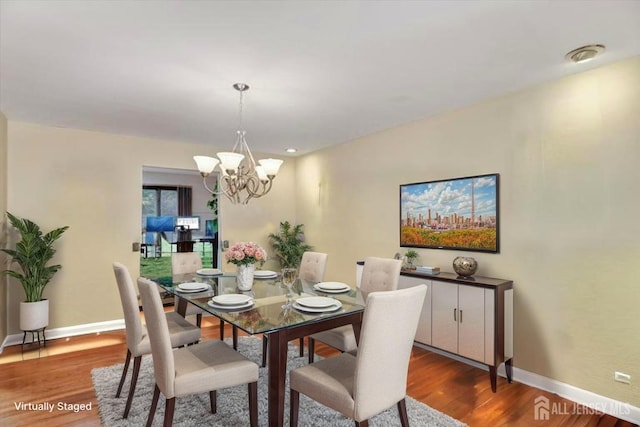 25 Deer Path, Holmdel, NJ 07733 - dining space with a chandelier and wood finished floors