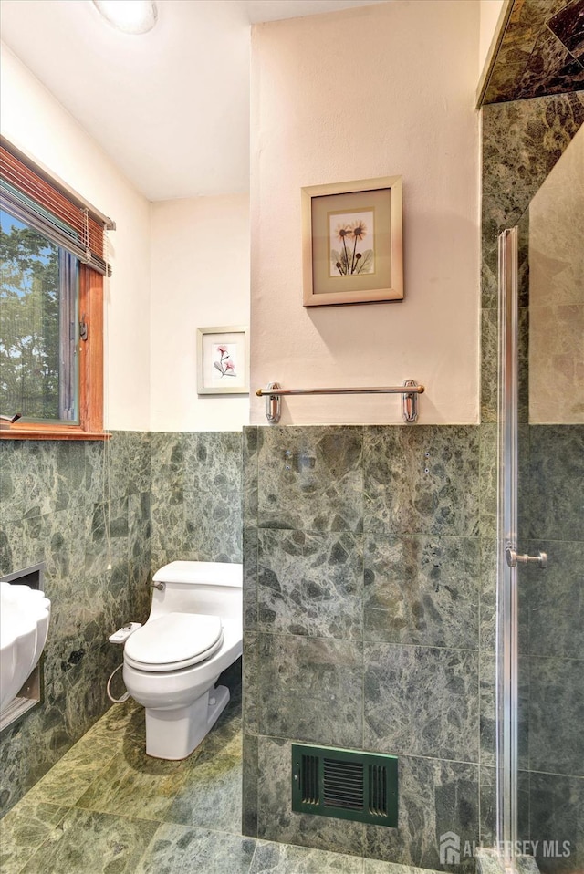 25 Deer Path, Holmdel, NJ 07733 - bathroom featuring toilet and tile walls