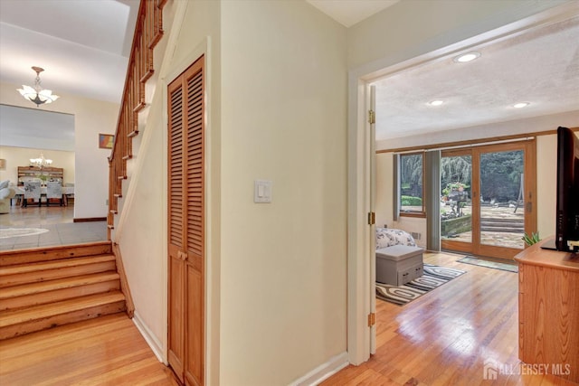 25 Deer Path, Holmdel, NJ 07733 - hall with stairway, a chandelier, recessed lighting, and light wood finished floors