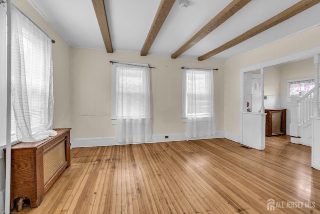 12 Dey St, Englishtown, NJ 07726 - unfurnished room with light wood-style flooring, baseboards, stairway, and beamed ceiling