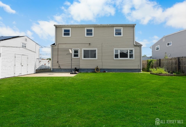 53 Tennyson St, Carteret, NJ 07008 - back of property featuring a patio