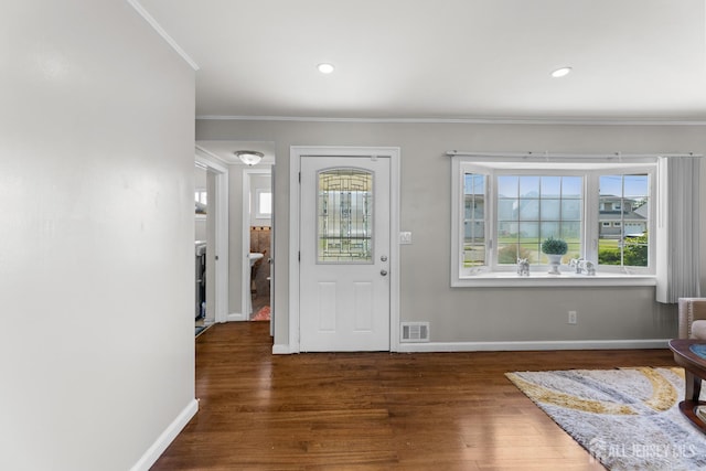 53 Tennyson St, Carteret, NJ 07008 - entryway featuring ornamental molding, wood finished floors, and recessed lighting