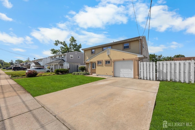 53 Tennyson St, Carteret, NJ 07008 - traditional home featuring driveway, stucco siding, a garage, and a residential view