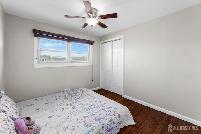 53 Tennyson St, Carteret, NJ 07008 - bedroom featuring dark wood-style flooring, a closet, and a ceiling fan