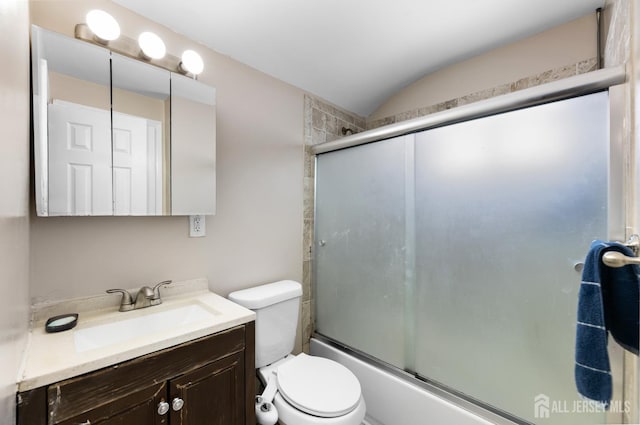 53 Tennyson St, Carteret, NJ 07008 - full bathroom with vanity, combined bath / shower with glass door, and vaulted ceiling
