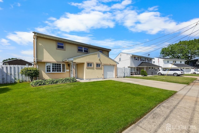 53 Tennyson St, Carteret, NJ 07008 - view of front of home with driveway and stucco siding