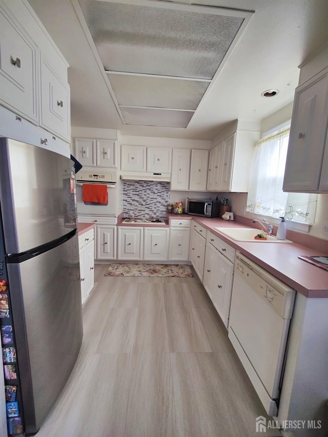 10-P Sussex Way, Monroe, NJ 08831 - kitchen with stainless steel appliances, a sink, and white cabinets