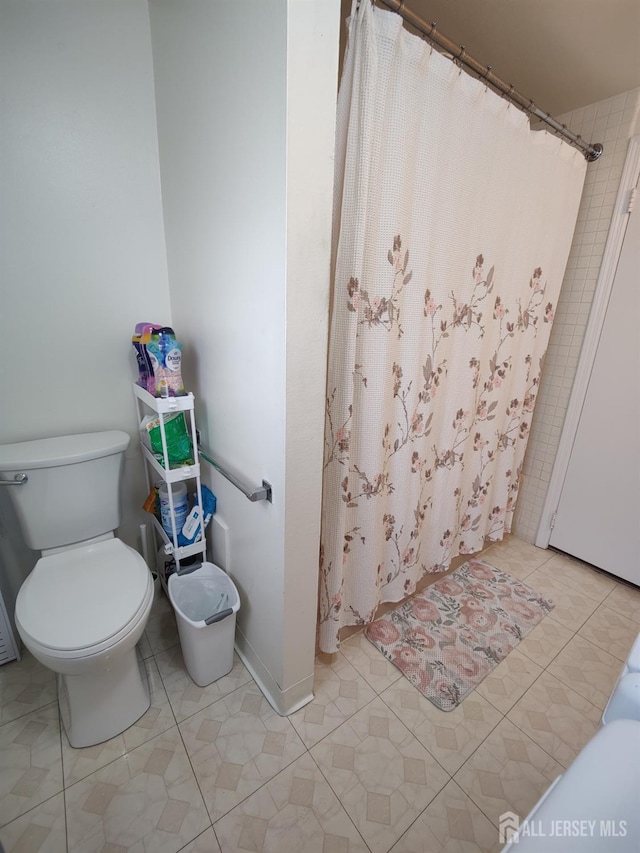 10-P Sussex Way, Monroe, NJ 08831 - full bathroom featuring toilet, tile patterned floors, and a shower with curtain