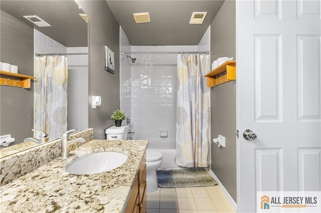 bathroom with vanity, visible vents, and toilet
