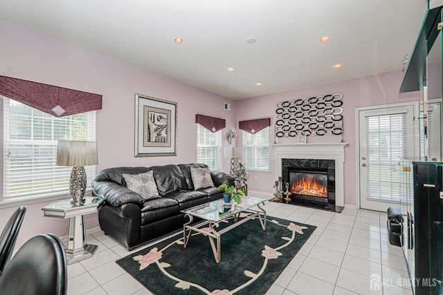 137 Murano Ave, Monroe, NJ 08831 - living area with light tile patterned flooring, a premium fireplace, recessed lighting, and baseboards