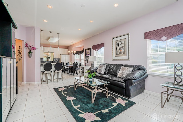 137 Murano Ave, Monroe, NJ 08831 - living area featuring plenty of natural light, light tile patterned floors, baseboards, recessed lighting, and a chandelier