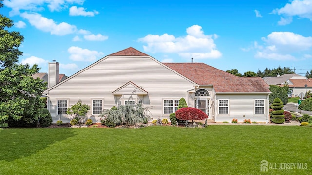 137 Murano Ave, Monroe, NJ 08831 - view of front facade featuring a chimney, a front lawn, and a shingled roof