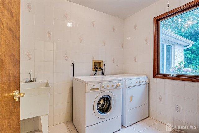 16 Benedek Rd, Princeton, NJ 08540 - laundry area featuring tile walls, light tile patterned flooring, healthy amount of natural light, and washing machine and dryer