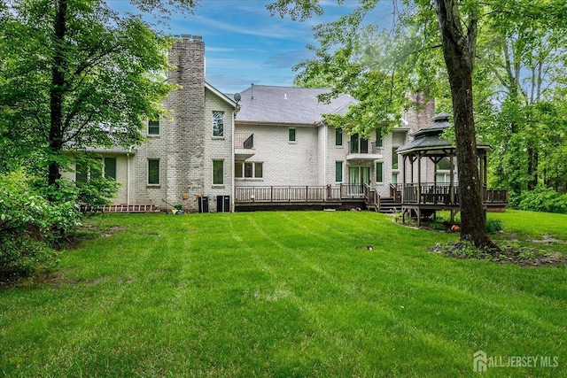 16 Benedek Rd, Princeton, NJ 08540 - back of property with a gazebo, a chimney, a lawn, and a wooden deck
