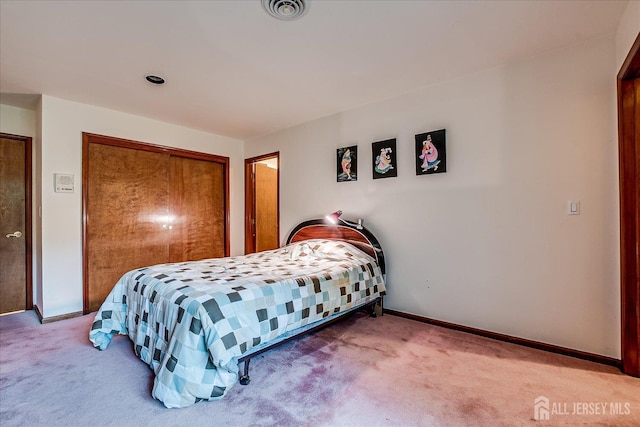 16 Benedek Rd, Princeton, NJ 08540 - bedroom featuring light colored carpet, baseboards, and a closet