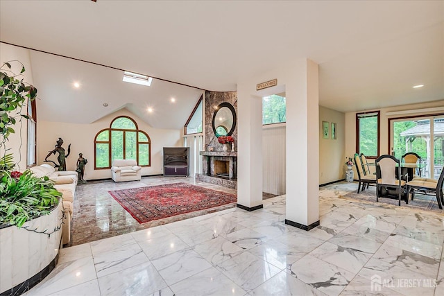 16 Benedek Rd, Princeton, NJ 08540 - living area with plenty of natural light, baseboards, marble tiled flooring, and lofted ceiling