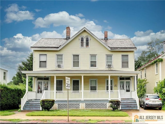 0-147-149 N Main St, Milltown, NJ 08850 - view of front facade featuring covered porch and a chimney