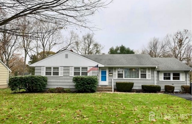 ranch-style home with a front yard