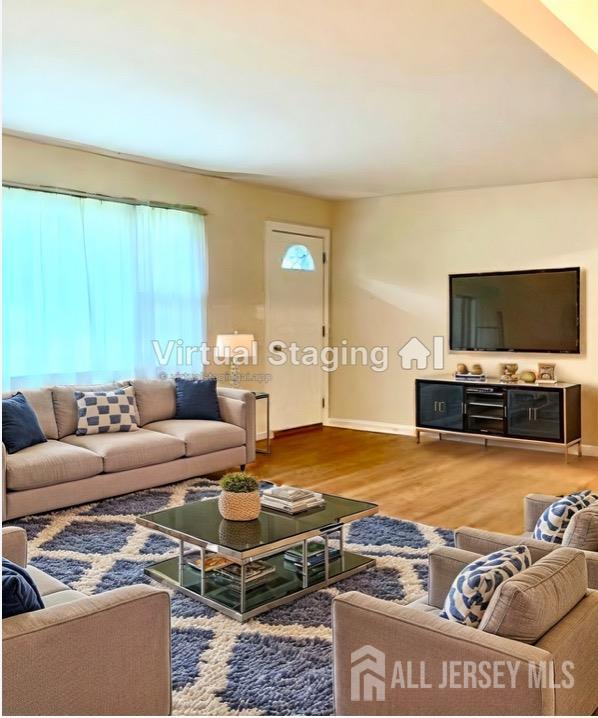 living room with hardwood / wood-style floors