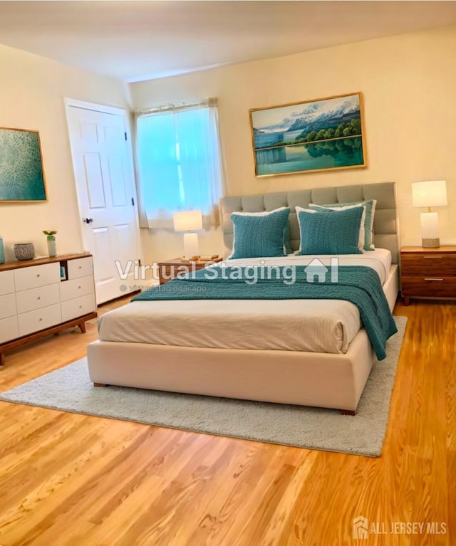 bedroom featuring hardwood / wood-style flooring