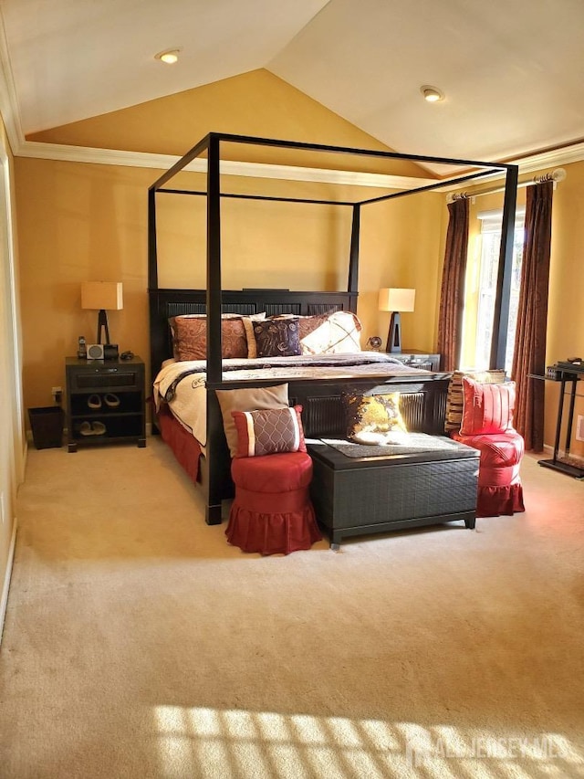 carpeted bedroom featuring lofted ceiling and crown molding