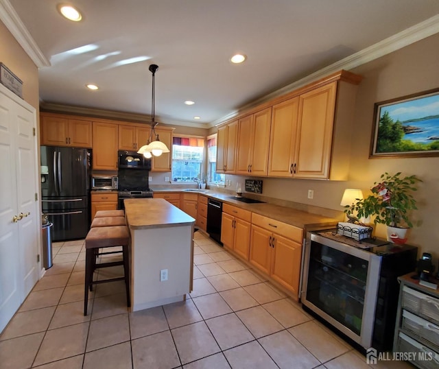 kitchen with beverage cooler, ornamental molding, light tile patterned floors, a kitchen breakfast bar, and black appliances