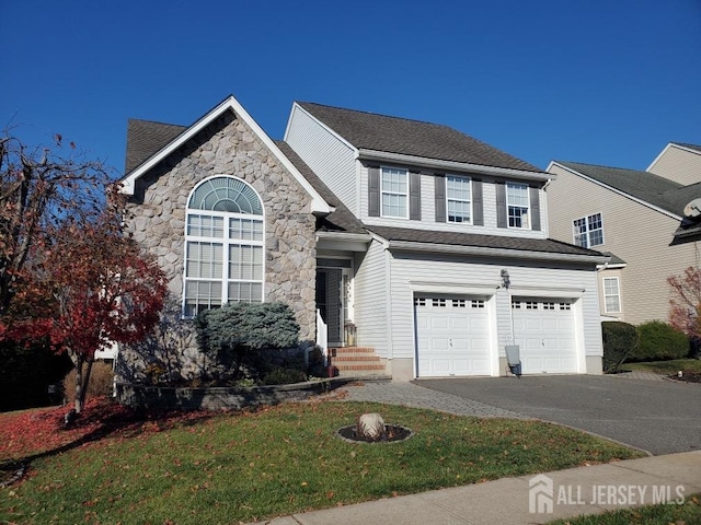 view of property featuring a garage