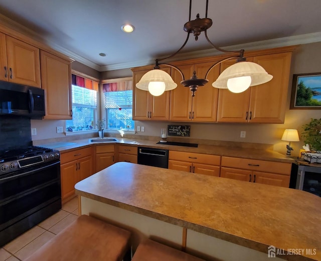 kitchen with light countertops, ornamental molding, light tile patterned floors, black appliances, and a sink