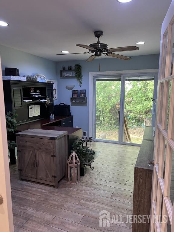 office with recessed lighting, wood finished floors, and ceiling fan