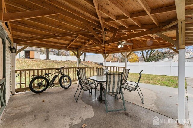 view of patio / terrace featuring ceiling fan