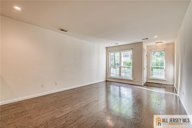 303 Harvest Ln, South Brunswick, NJ 08852 - unfurnished room with hardwood / wood-style flooring and recessed lighting
