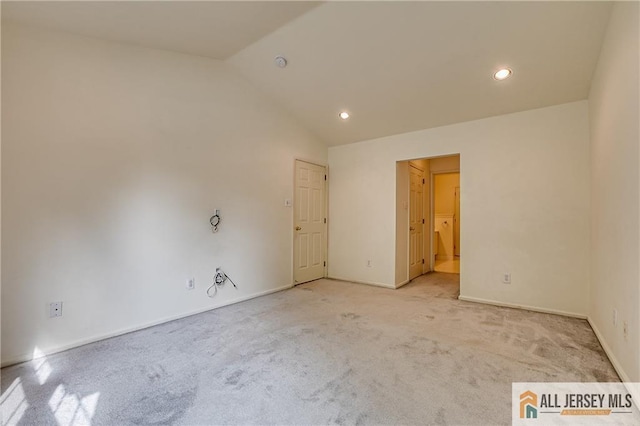 303 Harvest Ln, South Brunswick, NJ 08852 - empty room featuring vaulted ceiling, light colored carpet, recessed lighting, and a smoke detector