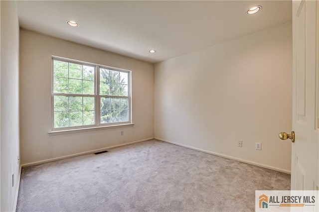 303 Harvest Ln, South Brunswick, NJ 08852 - spare room with carpet floors and recessed lighting