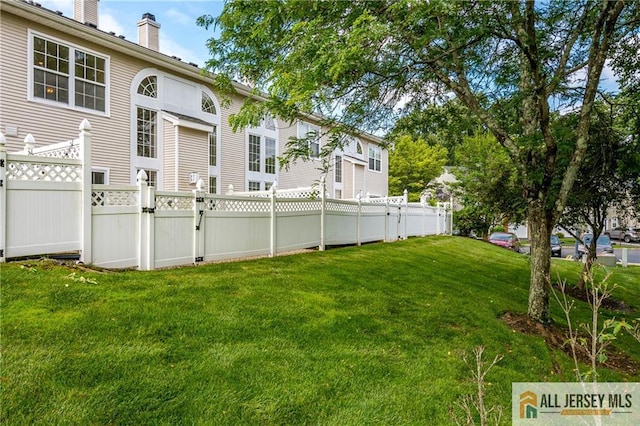 303 Harvest Ln, South Brunswick, NJ 08852 - view of yard featuring a gate