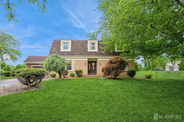 8 Appletree Ln, East Brunswick, NJ 08816 - front facade featuring a shingled roof, brick siding, and a garage