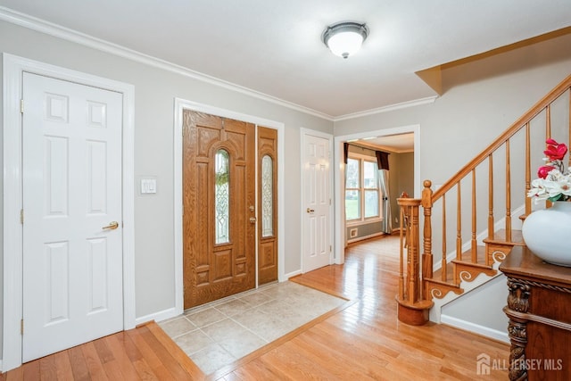 8 Appletree Ln, East Brunswick, NJ 08816 - entryway featuring light wood-type flooring, ornamental molding, stairway, and baseboards