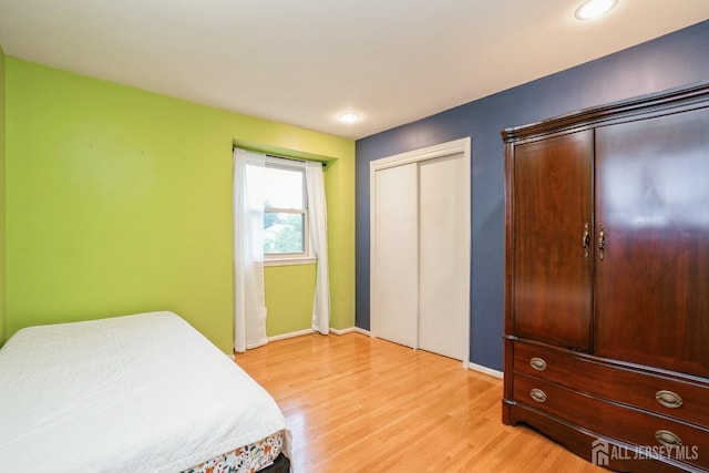 8 Appletree Ln, East Brunswick, NJ 08816 - bedroom with light wood finished floors, baseboards, and recessed lighting