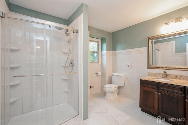 8 Appletree Ln, East Brunswick, NJ 08816 - bathroom with a shower stall, toilet, vanity, and tile walls