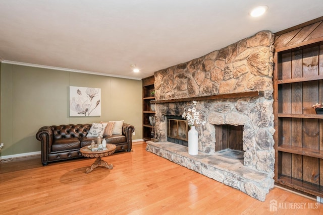 8 Appletree Ln, East Brunswick, NJ 08816 - living area with a fireplace, crown molding, wood finished floors, and baseboards