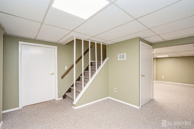 8 Appletree Ln, East Brunswick, NJ 08816 - finished below grade area with a paneled ceiling, stairs, carpet floors, and baseboards