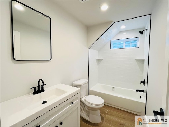 full bathroom featuring shower / tub combination, vanity, toilet, and wood-type flooring