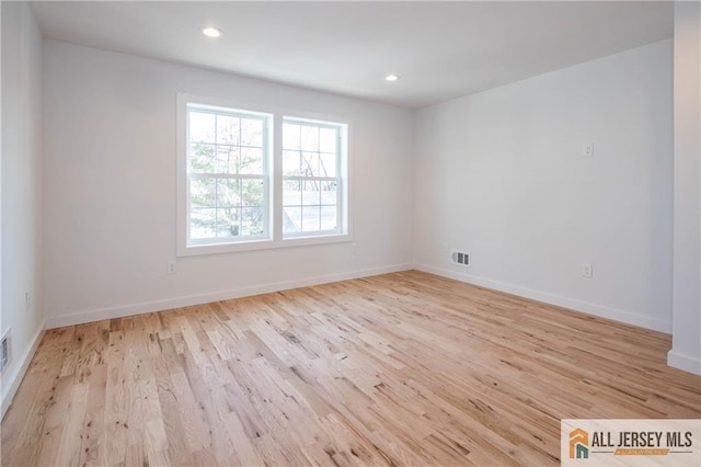 empty room featuring light wood-type flooring