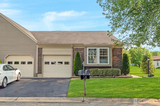 3 William Harrison Dr Unit A, Monroe, NJ 08831 - view of front of home with brick siding, driveway, a front yard, and a garage