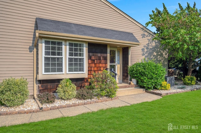 3 William Harrison Dr Unit A, Monroe, NJ 08831 - doorway to property featuring a lawn