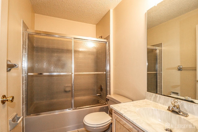 313 Prestwick Way, Edison, NJ 08820 - bathroom with a textured ceiling, vanity, toilet, and enclosed tub / shower combo
