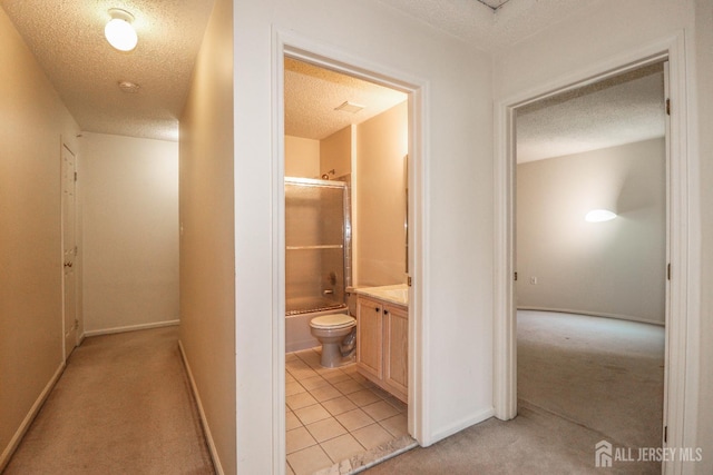 313 Prestwick Way, Edison, NJ 08820 - hallway featuring a textured ceiling, light colored carpet, and baseboards