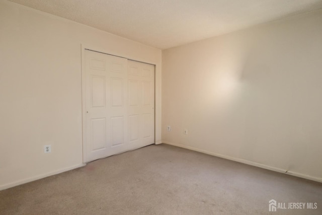 313 Prestwick Way, Edison, NJ 08820 - unfurnished bedroom featuring carpet, baseboards, and a closet