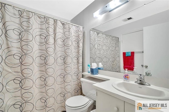 127 Pennsylvania Way N, Brunswick, NJ 08902 - full bath with toilet, vanity, and a shower with curtain